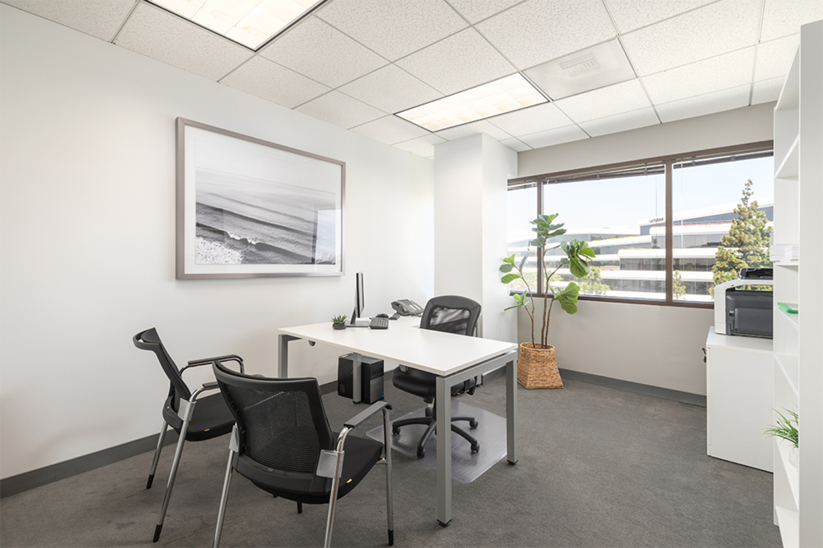 Private office with desk and chair.